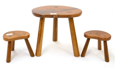 Lot 740 - Beaverman: A Colin Almack (Sutton-under-Whitestonecliffe) English Oak Calf Stool, on three...