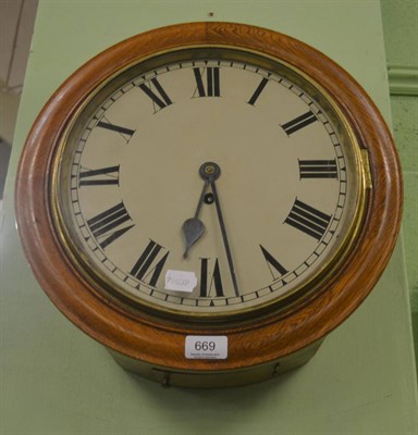 Lot 669 - A 19th century light oak cased wall clock with fusee movement