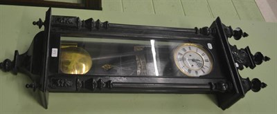 Lot 672 - Vienna style wall clock in an ebonised case, with key, weights and pendulum