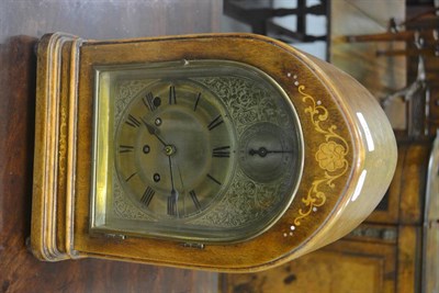 Lot 706 - A late Victorian inlaid chiming bracket clock