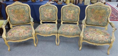 Lot 734 - Four 19th century French painted salon chairs comprising two armchairs and two side chairs