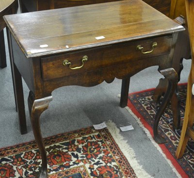 Lot 739 - An 18th century oak lowboy