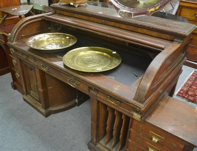 Lot 749 - A 19th century oak Wooton roll top desk