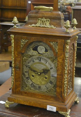 Lot 750 - A reproduction striking table clock