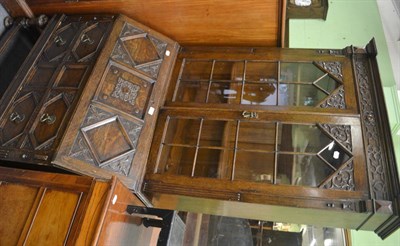 Lot 763 - Carved oak bureau bookcase