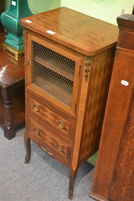 Lot 773 - A walnut parquetry ormolu mounted French cabinet