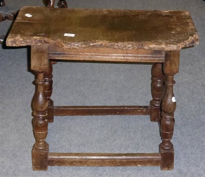 Lot 781 - A large 17th century oak coffin stool