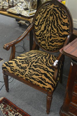 Lot 798 - Two modern armchairs upholstered in tiger print fabric