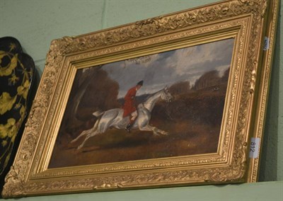 Lot 812 - A 19th century oil on board of a huntsman, in gilt frame