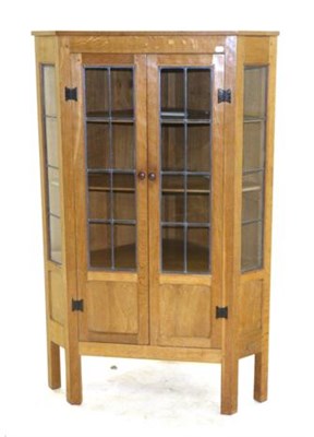 Lot 760 - Squirrelman: A Wilfred Hutchinson (Husthwaite) English Oak Floor Standing Corner Cupboard, with...