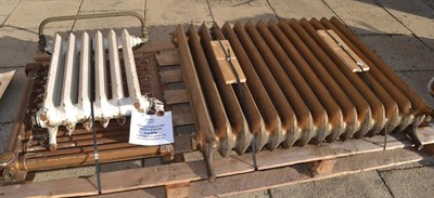 Lot 876 - Large cast iron radiator and two smaller examples (3)