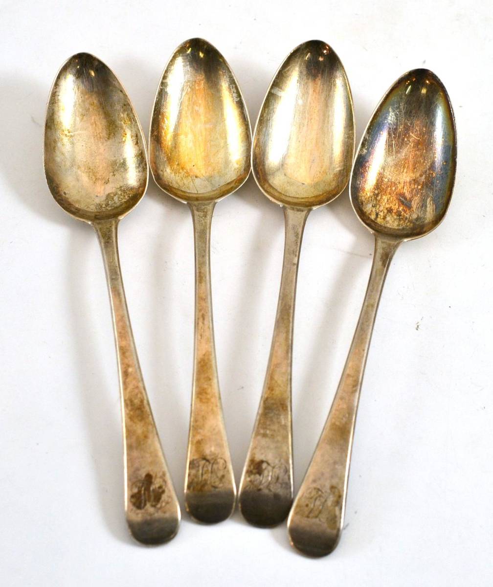 Lot 5 - Four George III silver spoons