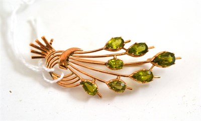 Lot 18 - Peridot set brooch, stamped '14K'