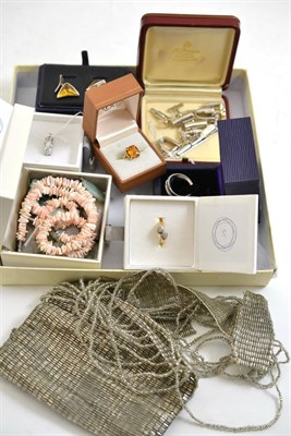 Lot 28 - A three stone ring, a 9ct gold opal ring, a dress ring, a silver ring, charms, cufflinks, etc