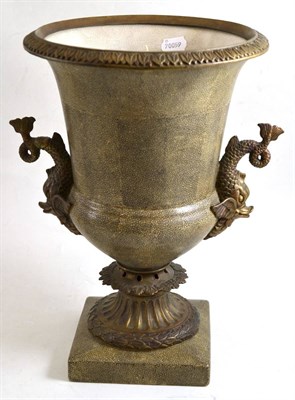 Lot 55 - An urn with dolphin handles