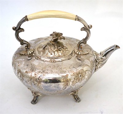 Lot 60 - An Old Sheffield Plate tea kettle/teapot, of melon form and chased with flowers and foliage, with a