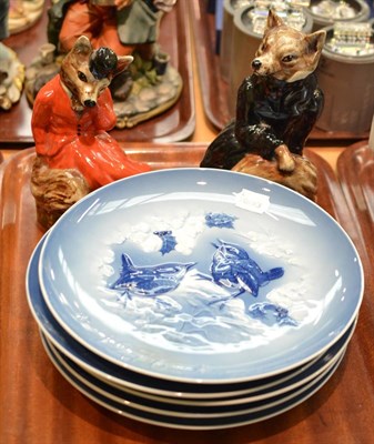 Lot 71 - Five Hutschenreuther Christmas plates (1975-1979) and a pair of Staffordshire fox figures