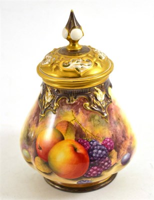 Lot 140 - A Royal Worcester fruit painted pot pourri jar and cover, signed C Hughes, 16cm high