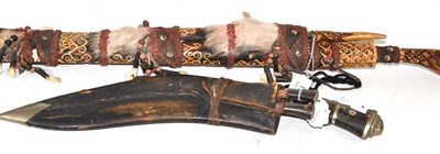 Lot 152 - A Borneo sword and kukri