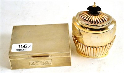 Lot 156 - A silver cigarette box and a silver tea caddy