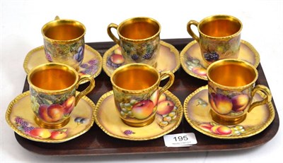 Lot 195 - A set of six Royal Worcester fruit painted coffee cans and saucers, five signed A Kendry and...