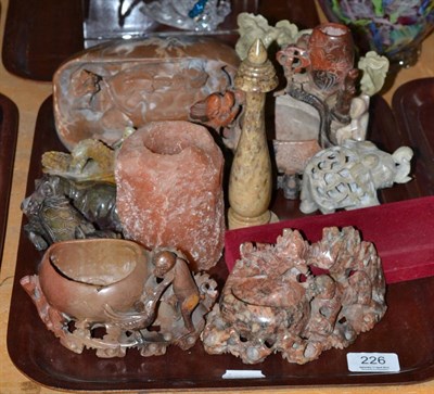 Lot 226 - A collection of soapstone carvings including Chinese brush pots, etc