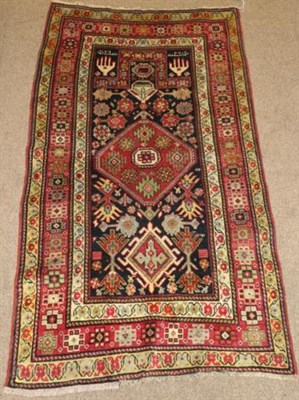 Lot 790 - Rare Karabagh Prayer Rug South Caucasus, circa 1890 The indigo field of stylised flowerheads...