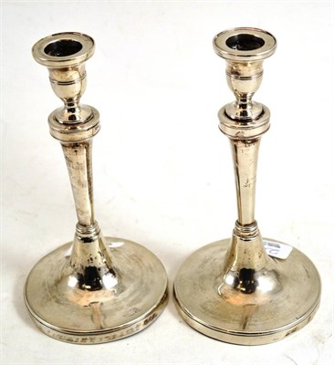 Lot 240 - A pair of 19th century silver candlesticks, stamped 'RS' and another mark, possibly French...