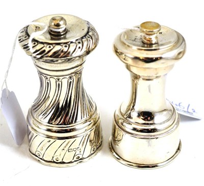 Lot 246 - Two silver capstan pepper mills, early 20th century