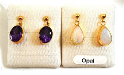 Lot 276 - A pair of 9ct gold opal earrings and a pair of 9ct gold amethyst earrings