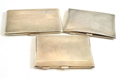 Lot 279 - Three engine turned Art Deco silver cigarette cases, Birmingham 1932, 1946 and Chester 1946,...