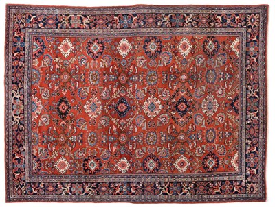 Lot 797 - Sultanabad Carpet West Iran, circa 1930 The abrashed strawberry field with an all over design...