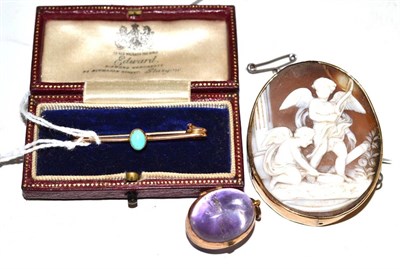 Lot 290 - A cameo brooch (a.f.), a turquoise set bar brooch, and an amethyst egg shaped pendant (3)