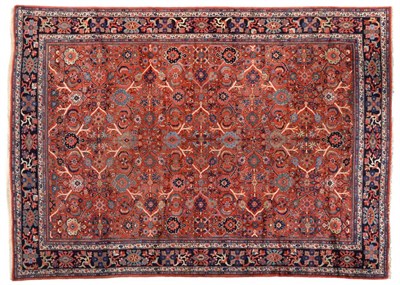 Lot 800 - Good Mahal Carpet West Iran, circa 1920 The brick red field with an allover lattice design of...