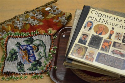 Lot 311 - Wool and beadwork shield shape banner with armorial, circa 1940s ledger handwritten with dress...