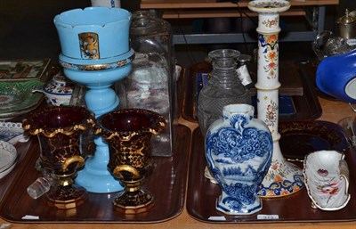 Lot 313 - Ceramics and glass comprising a pair of Bohemian ruby urns and a plate, blue lustre, two decanters