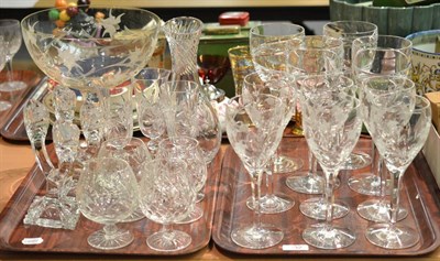 Lot 332 - A set of four Jasper Conran for Stuart Crystal Aura pattern wine glasses, 25cm high, a set of...