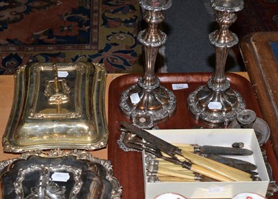 Lot 345 - Two silver plated entree dishes, pair of candlesticks, two flat candlesticks, a quantity of...