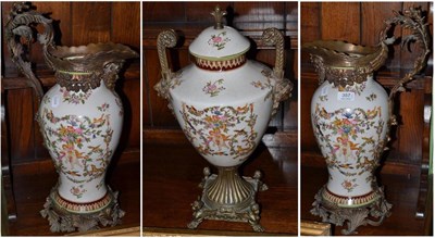 Lot 357 - A reproduction pottery and gilt mantel garniture