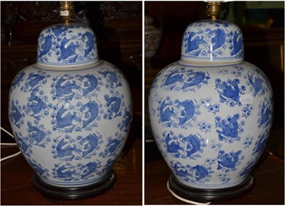 Lot 366 - Pair of blue and white porcelain lamps