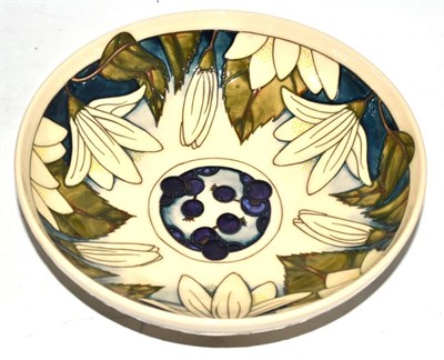 Lot 378 - A modern Moorcroft Juneberry pattern bowl, designed by Anji Davenport, impressed factory marks...