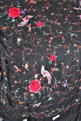 Lot 410 - A Chinese embroidered silk shawl