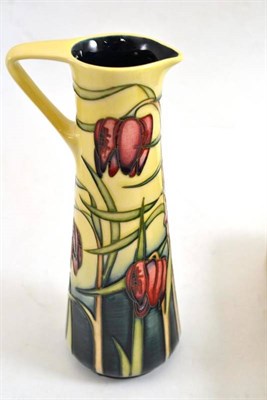 Lot 425 - A Modern Moorcroft Cricklade pattern jug, designed by Emma Bossons, on a cream ground,...