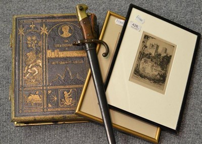 Lot 426 - A French 1874 gras sword bayonet, one volume of The Life and Explorations of Dr Livingstone, an...