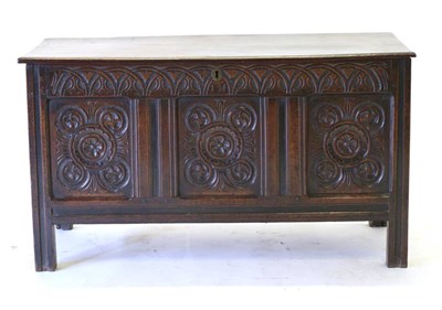 Lot 821 - A 17th Century Joined Oak Chest, with hinged lid above a lunette carved frieze carved with initials