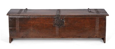 Lot 824 - A 17th Century Oak Chest, of six plank construction with iron strapwork and geometric carving,...