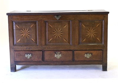 Lot 826 - A George III Joined Oak Chest, late 18th century, the hinged lid above three fielded panels...