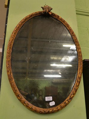 Lot 522 - An early 19th century carved giltwood mirror