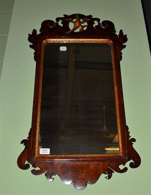 Lot 524 - A George III style fret cut mirror