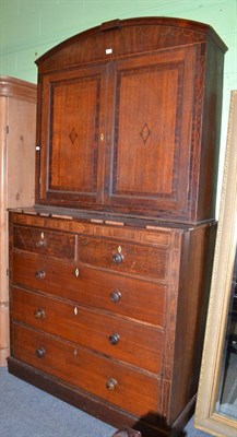 Lot 533 - A Victorian oak chest of drawers with a cupboard top, each with matching boxwood stringing